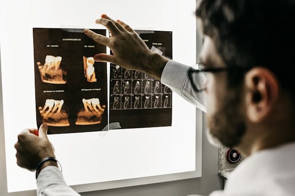 Dentist performing dental procedure in a modern clinic