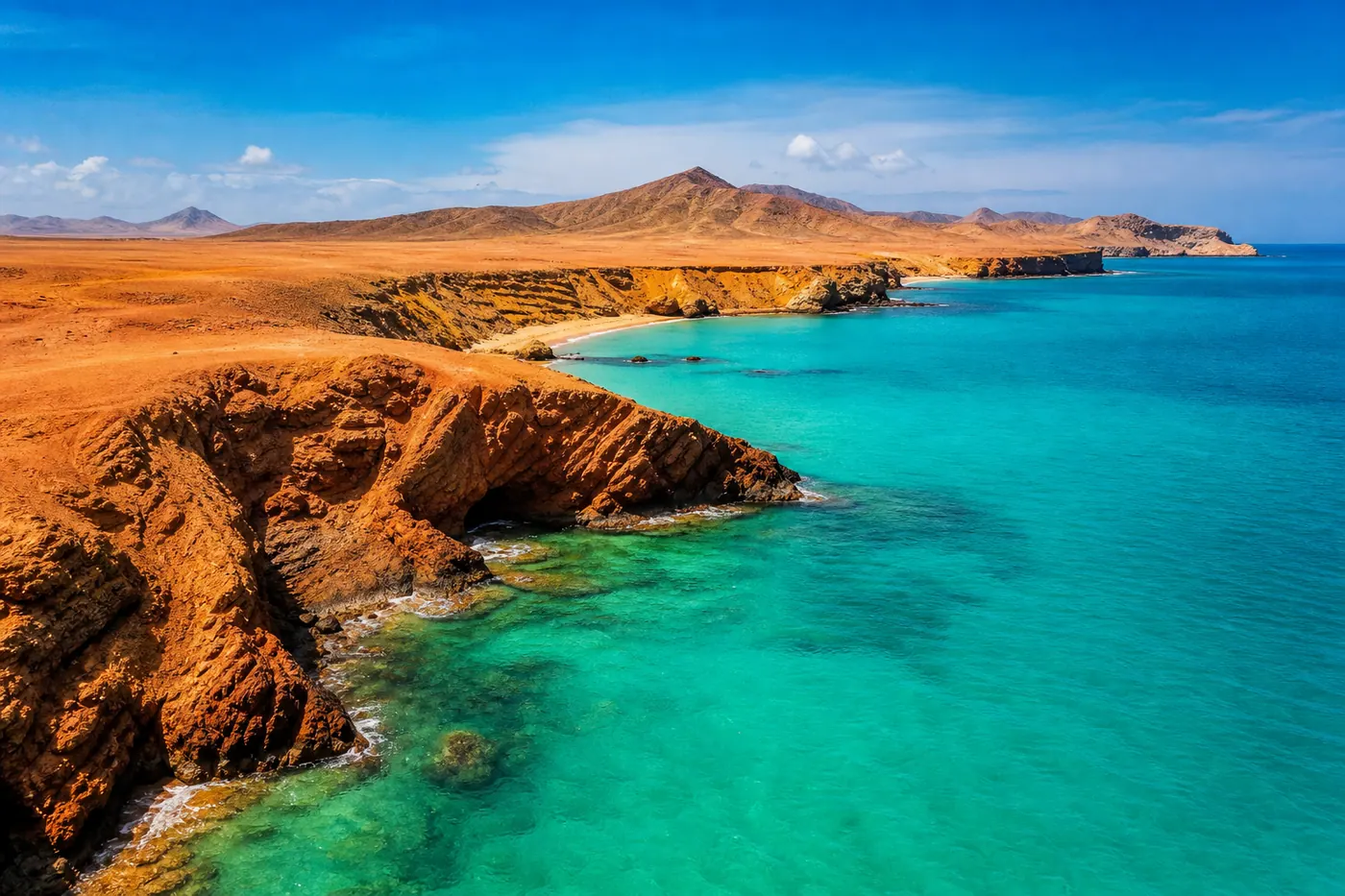 Cabo de la Vela, La Guajira Colombia — desert cliffs meeting turquoise Caribbean water