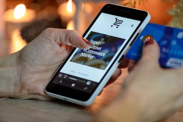 Person browsing marketplace listings on phone in Colombia