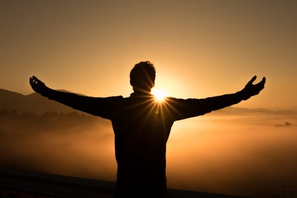 Person contemplating alone representing expat loneliness