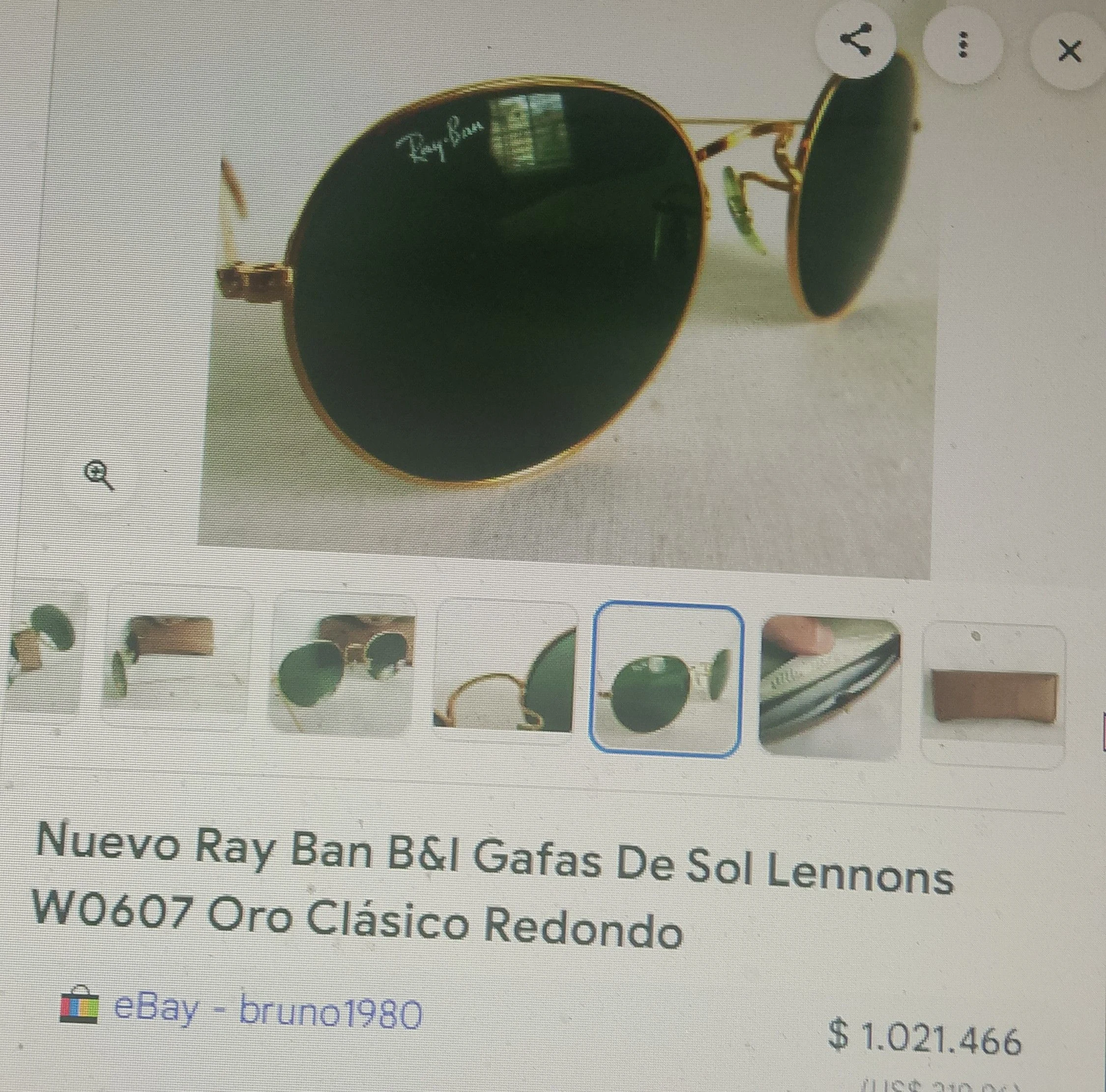 Venta de accesorios y joyería en Bogotá: Gafas de sol Ray-Ban redondas con montura dorada y lentes verde oscuro — Colombia Move
