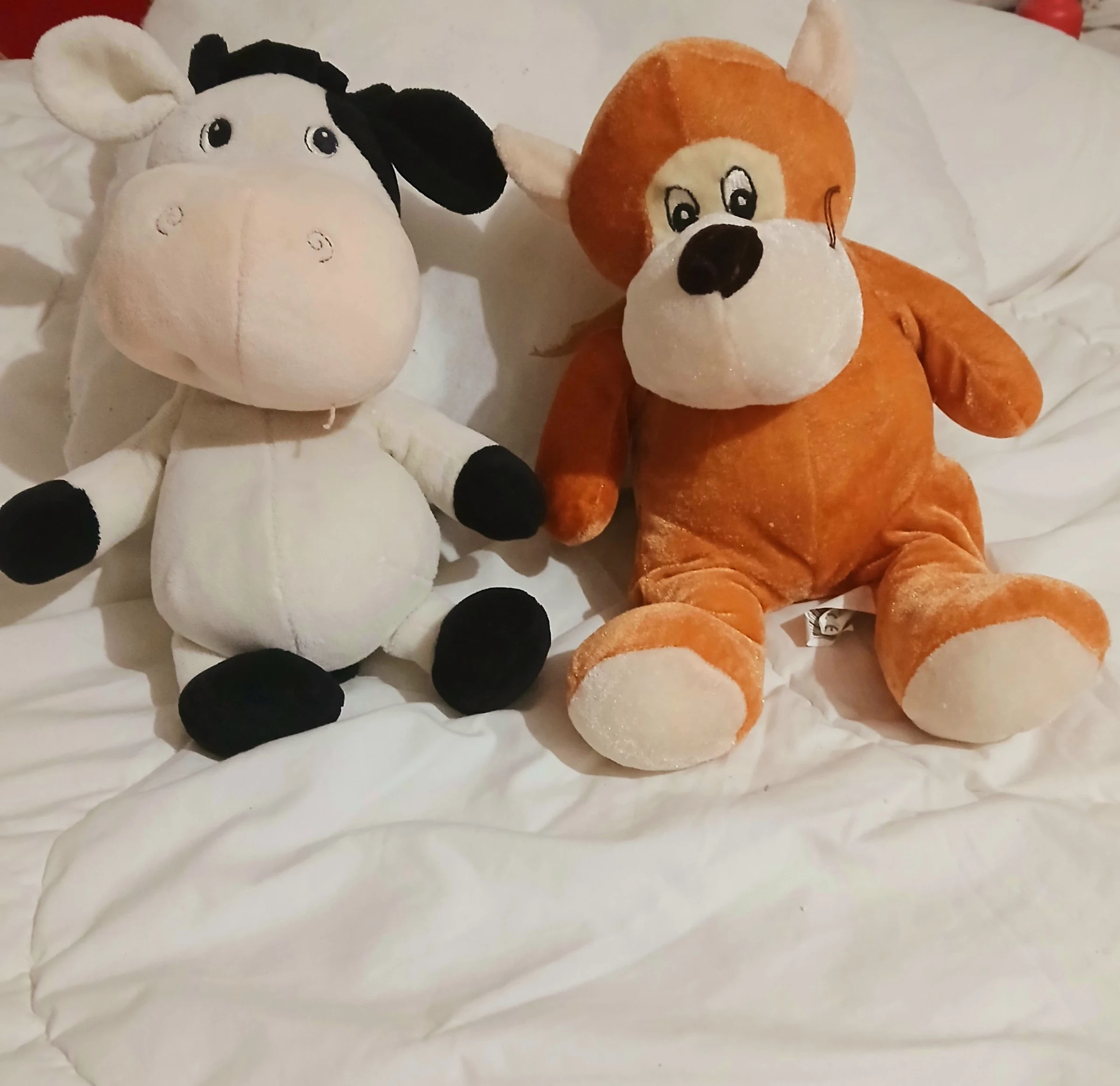 Venta de juguetes y estimulación en Usaquén, Bogotá: Peluches de vaca y mono — Colombia Move