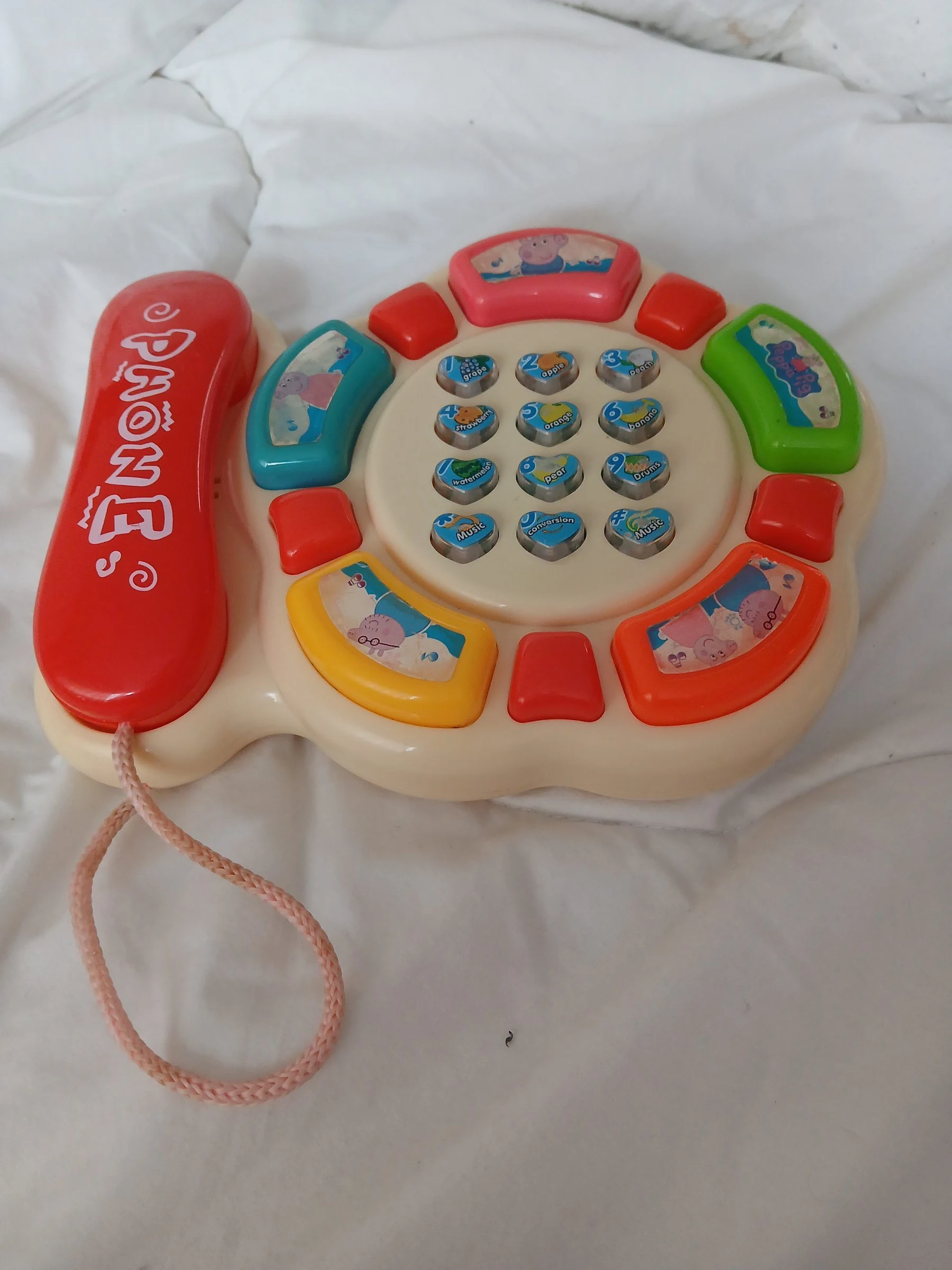 Venta de juguetes y estimulación en Bogotá: Teléfono de juguete interactivo Peppa Pig — Colombia Move