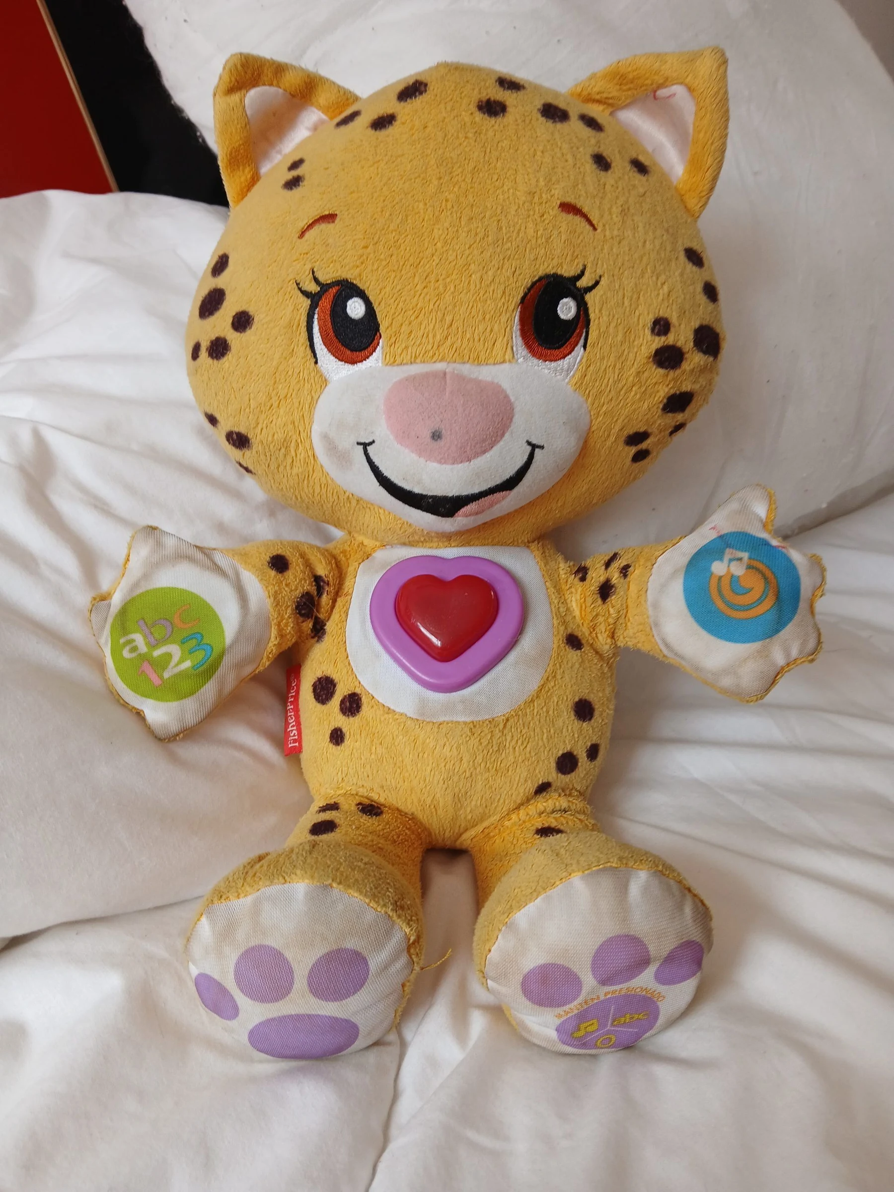 Venta de juguetes y estimulación en Bogotá: Peluche interactivo Fisher-Price de leopardo — Colombia Move
